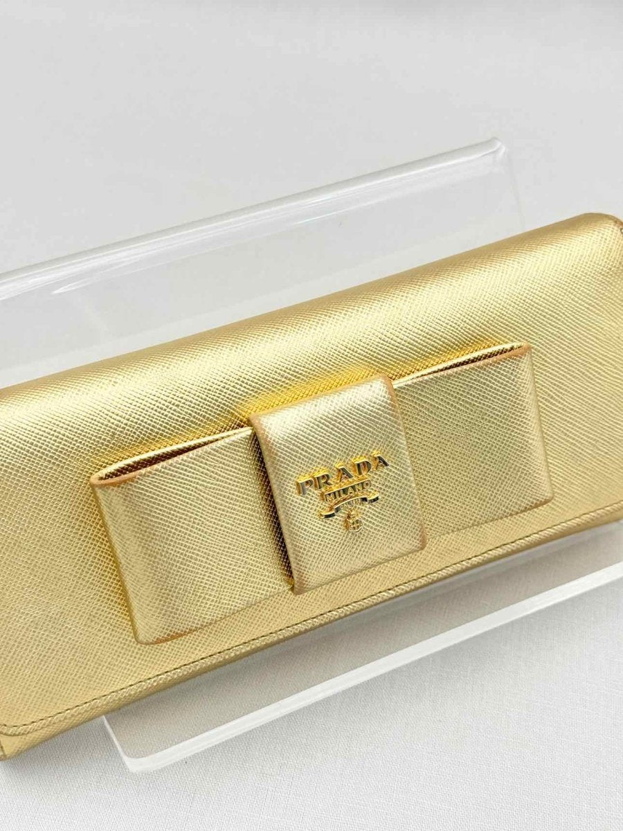 Pre-loved PRADA Gold Continental Wallet at Reems Closet