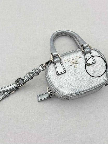Pre - loved PRADA Metallic Silver Bag Charm at Reems Closet