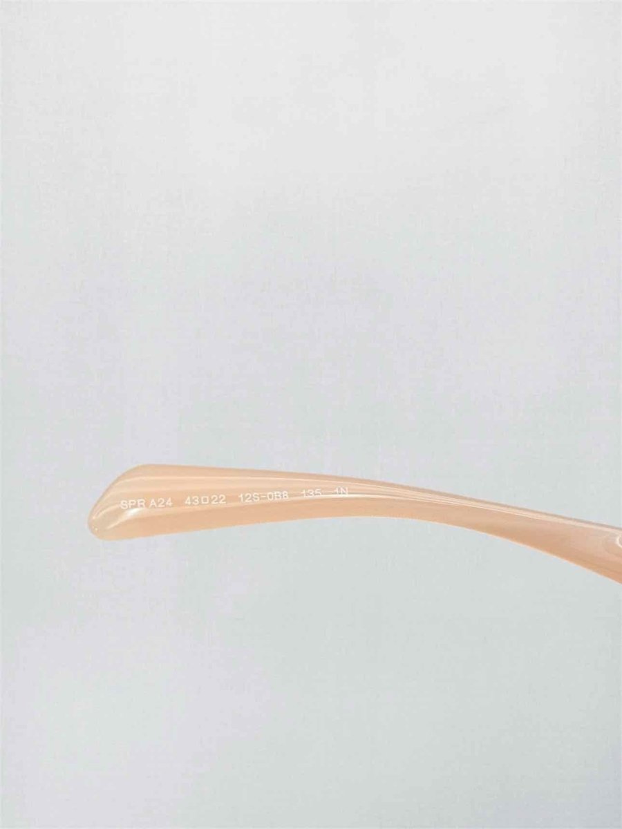 Pre-loved PRADA Peach Sunglasses at Reems Closet