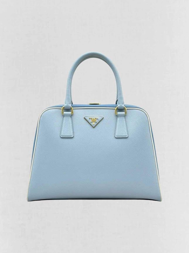 Pre - loved PRADA Pyramid Light Blue Top Handle at Reems Closet