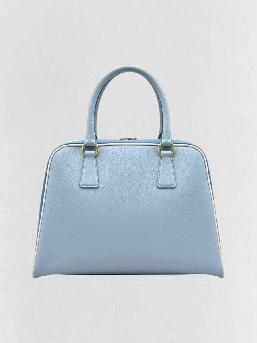 Pre - loved PRADA Pyramid Light Blue Top Handle at Reems Closet