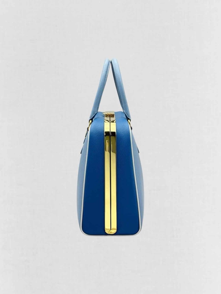 Pre - loved PRADA Pyramid Light Blue Top Handle at Reems Closet