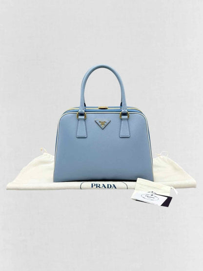 Pre - loved PRADA Pyramid Light Blue Top Handle at Reems Closet