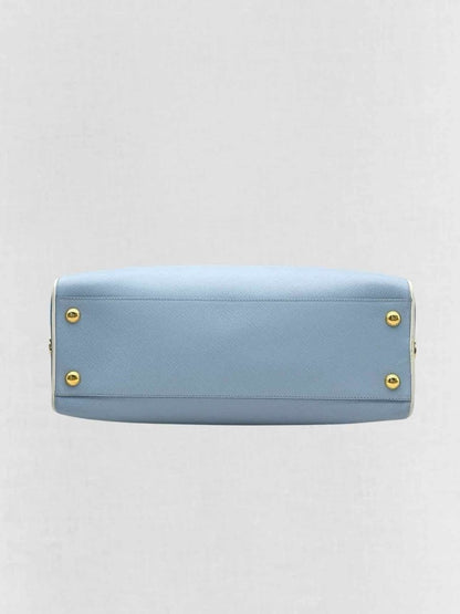 Pre - loved PRADA Pyramid Light Blue Top Handle at Reems Closet