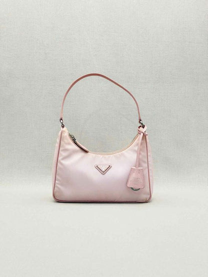 Pre-loved PRADA Re-Edition 2000 Pastel Pink Hobo bag at Reems Closet