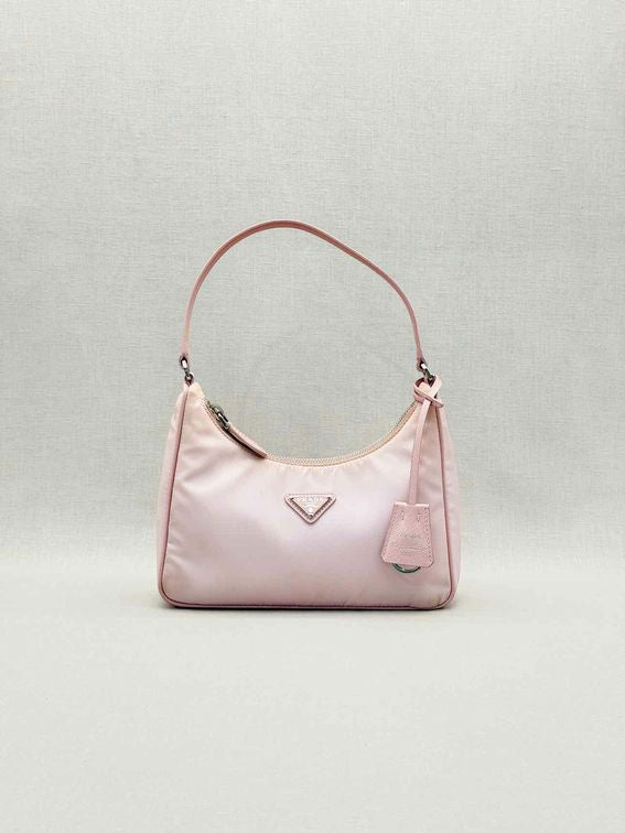 Pre-loved PRADA Re-Edition 2000 Pastel Pink Hobo bag at Reems Closet