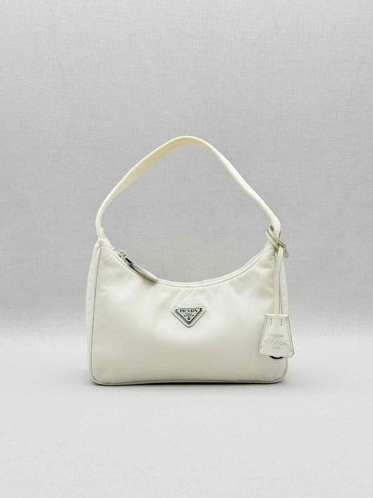 Pre - loved PRADA Re - Nylon Off - white Hobo bag at Reems Closet