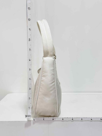 Pre - loved PRADA Re - Nylon Off - white Hobo bag at Reems Closet