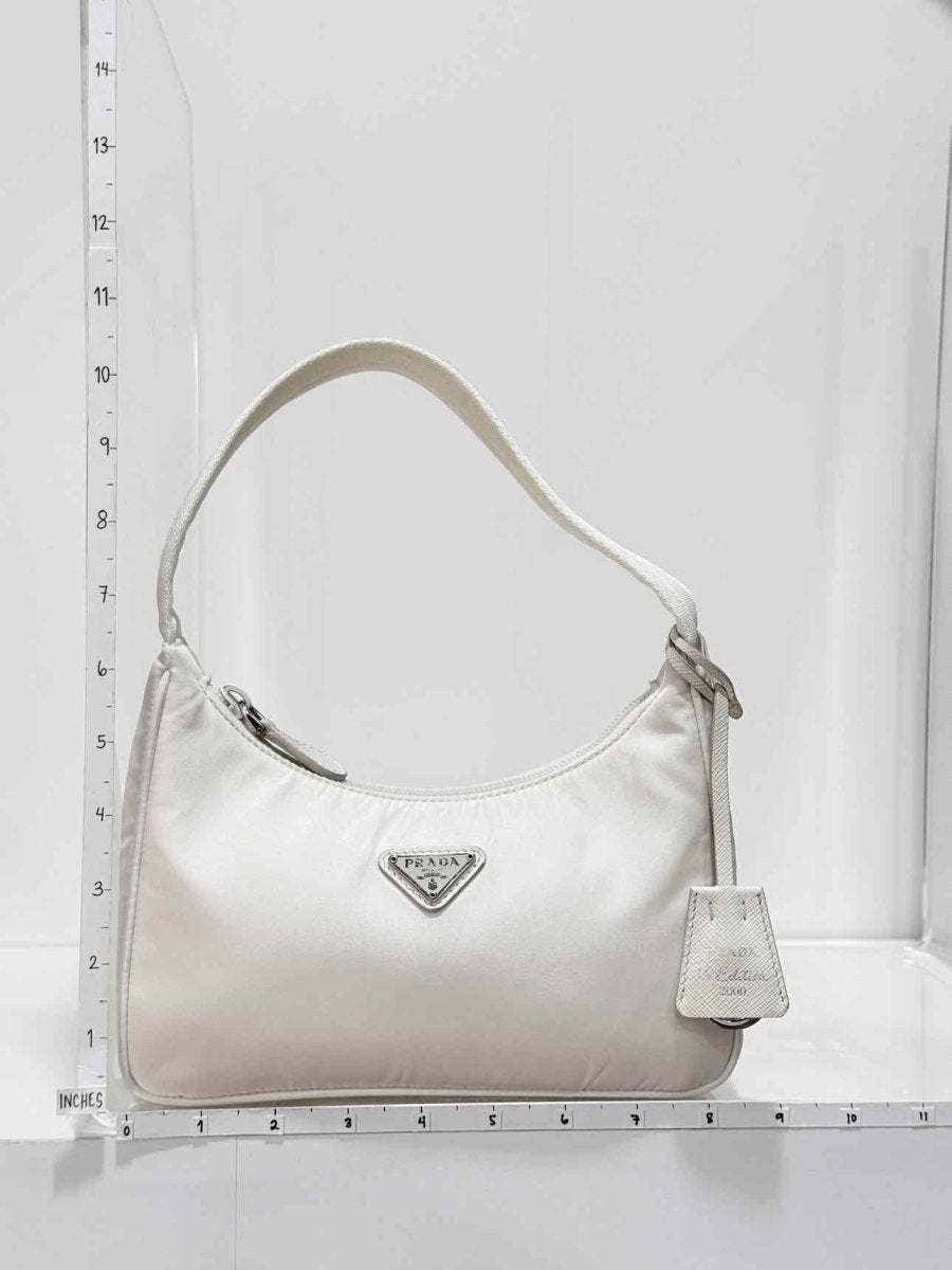 Pre - loved PRADA Re - Nylon Off - white Hobo bag at Reems Closet