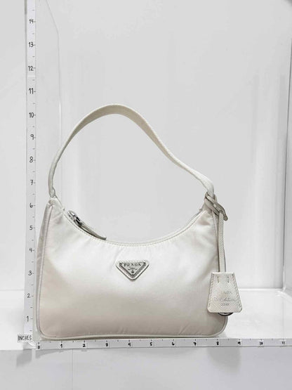 Pre - loved PRADA Re - Nylon Off - white Hobo bag at Reems Closet