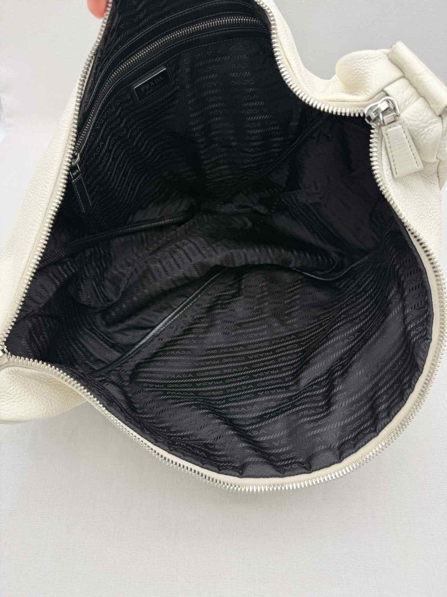 Pre-loved PRADA Triangle Off-white Shoulder Bag at Reems Closet