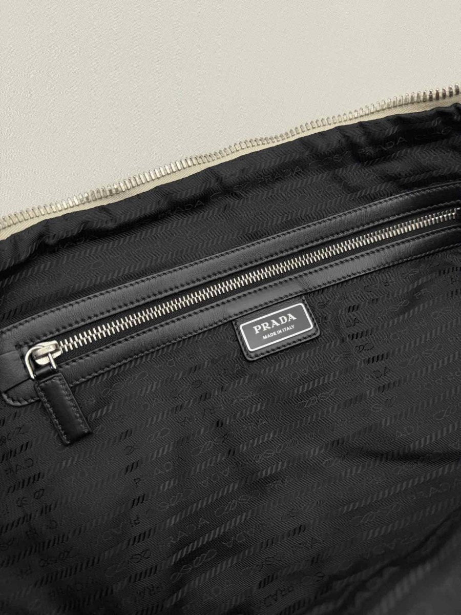 Pre-loved PRADA Triangle Off-white Shoulder Bag at Reems Closet