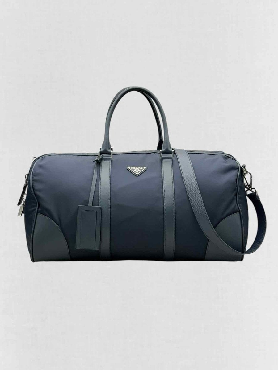 Pre - loved PRADA Weekender Navy Blue Duffel bag at Reems Closet