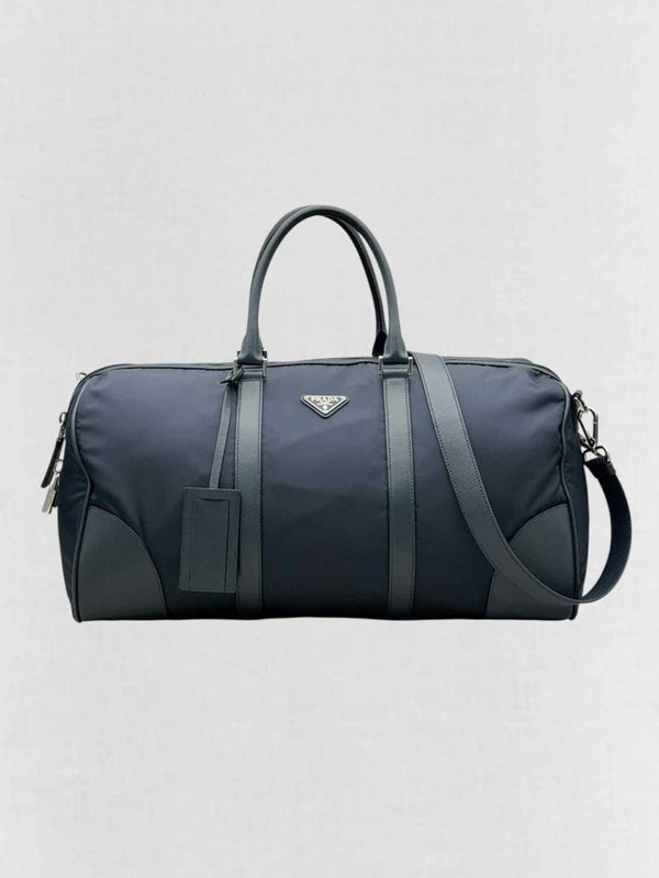 Pre - loved PRADA Weekender Navy Blue Duffel bag at Reems Closet