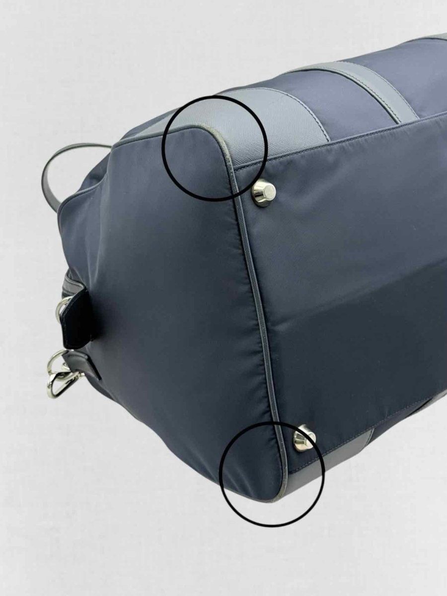 Pre - loved PRADA Weekender Navy Blue Duffel bag at Reems Closet