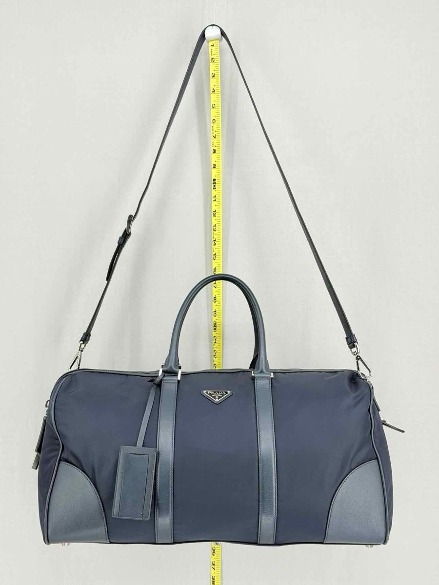 Pre - loved PRADA Weekender Navy Blue Duffel bag at Reems Closet