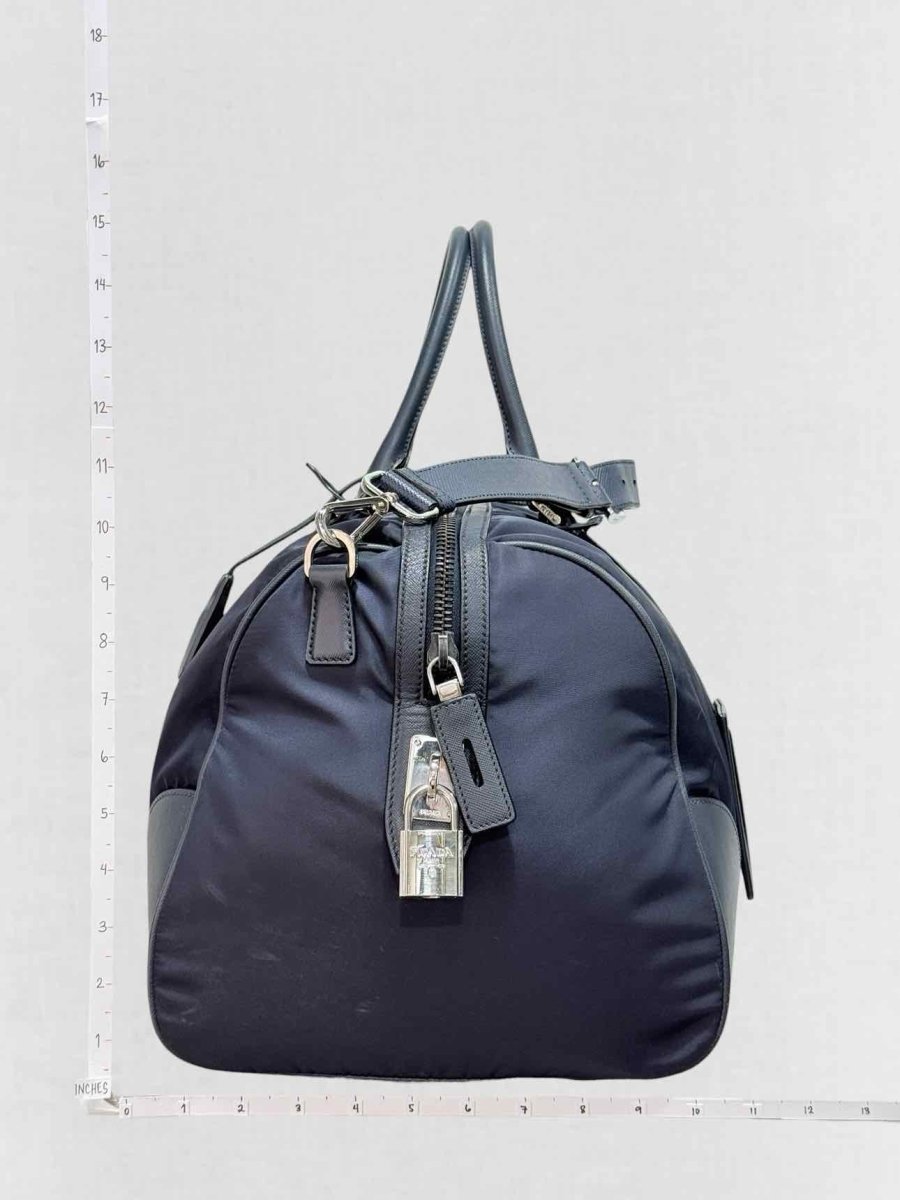 Pre - loved PRADA Weekender Navy Blue Duffel bag at Reems Closet