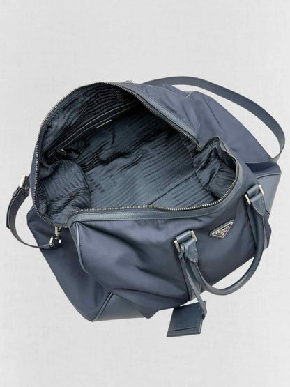 Pre - loved PRADA Weekender Navy Blue Duffel bag at Reems Closet