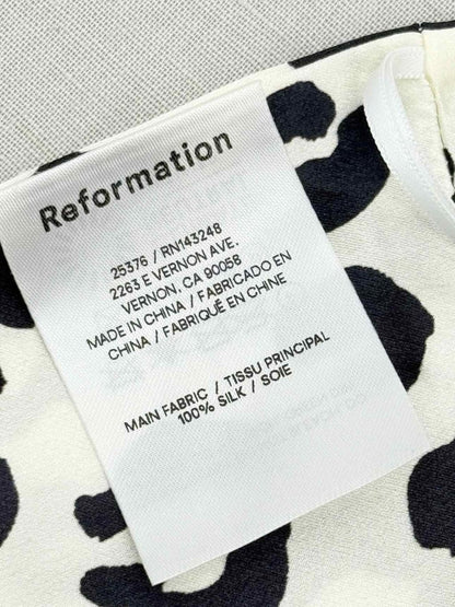 Pre-loved REFORMATION Wade White & Black Size Small Top at Reems Closet