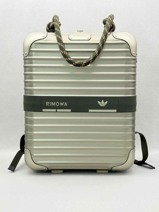 Pre-loved RIMOWA NMD Metallic Beige Backpack at Reems Closet