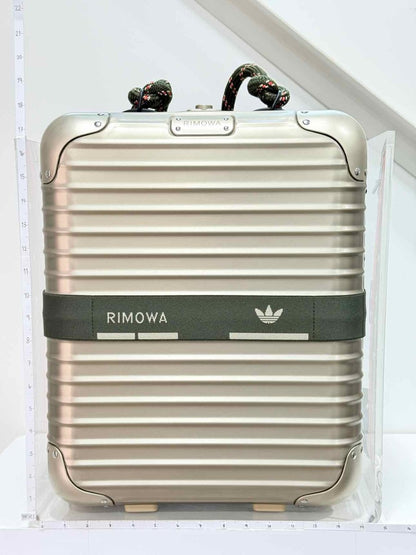 Pre-loved RIMOWA NMD Metallic Beige Backpack at Reems Closet