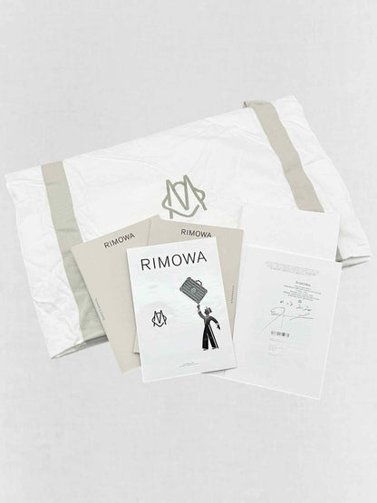 Pre - loved RIMOWA Trunk Silver Rolling Luggage at Reems Closet