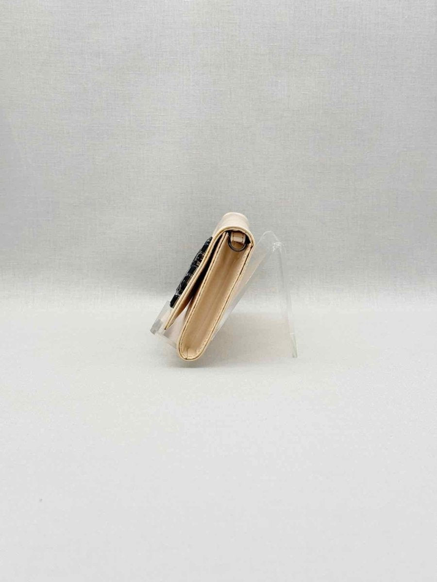 Pre-loved ROBERTO CAVALLI Beige Clutch at Reems Closet