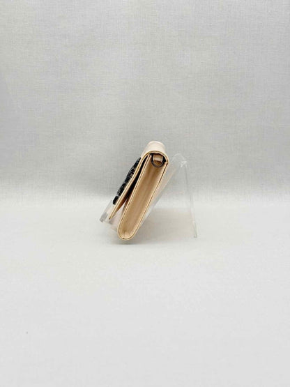 Pre-loved ROBERTO CAVALLI Beige Clutch at Reems Closet