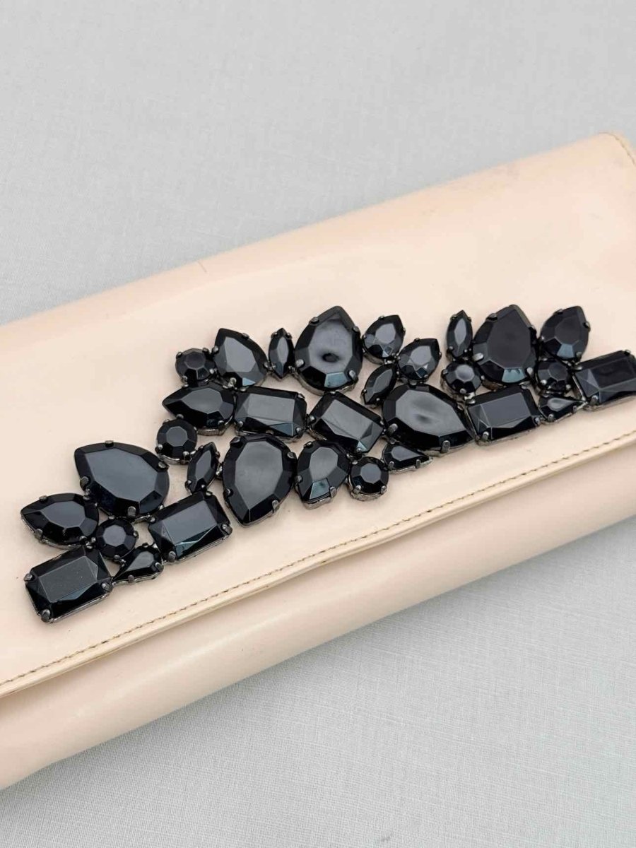 Pre-loved ROBERTO CAVALLI Beige Clutch at Reems Closet