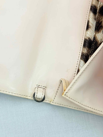 Pre-loved ROBERTO CAVALLI Beige Clutch at Reems Closet
