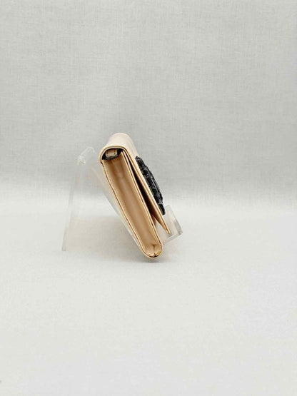 Pre-loved ROBERTO CAVALLI Beige Clutch at Reems Closet