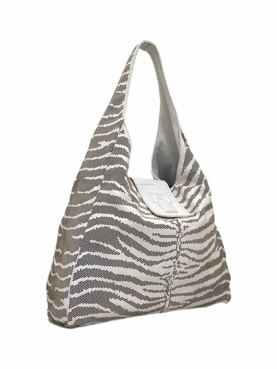 Pre - loved ROBERTO CAVALLI Laser Cut White Hobo bag at Reems Closet