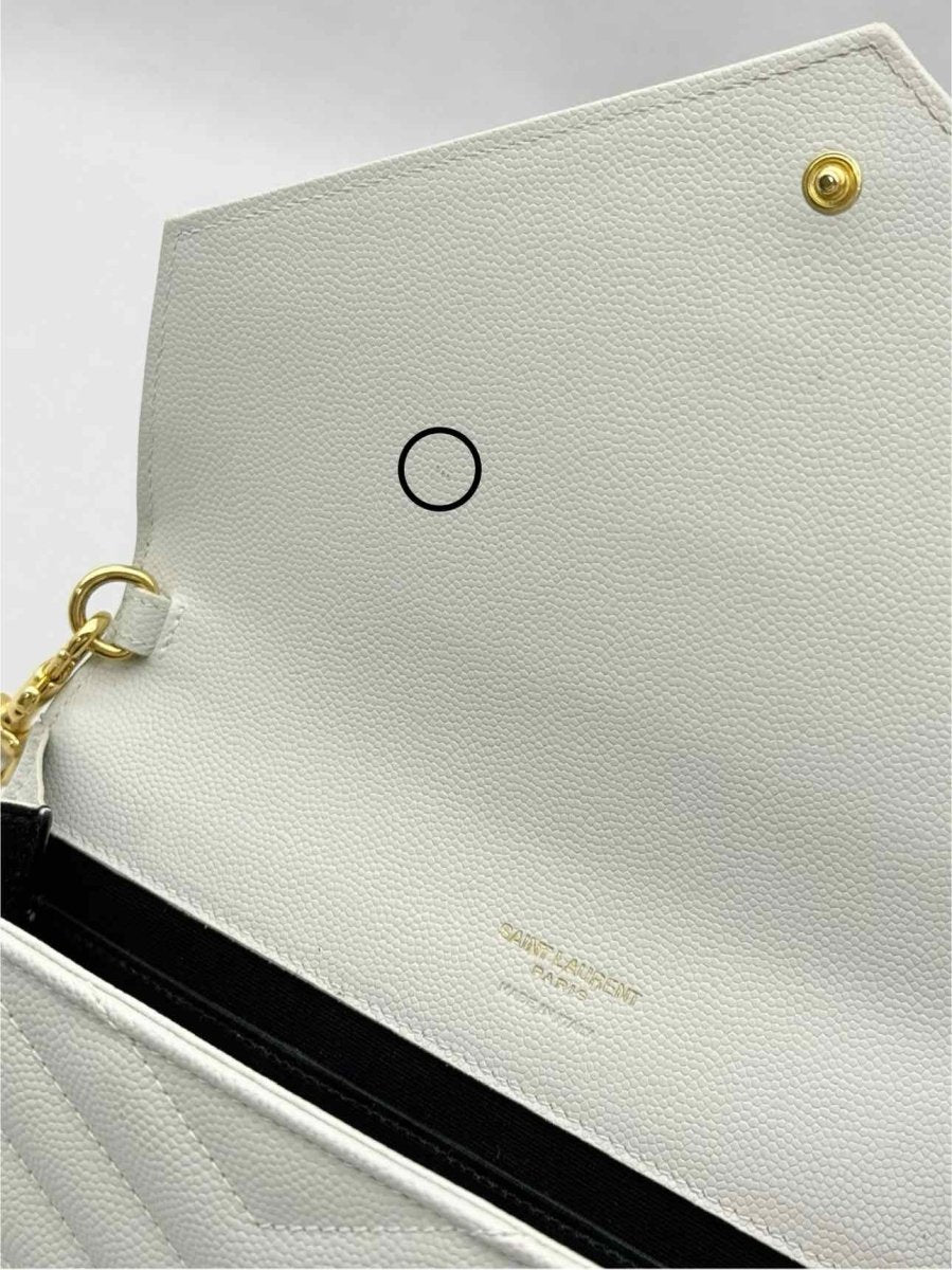 Pre-loved SAINT LAURENT Cassandre Matelasse Flap White Wristlet at Reems Closet