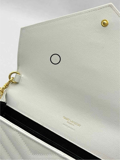 Pre-loved SAINT LAURENT Cassandre Matelasse Flap White Wristlet at Reems Closet