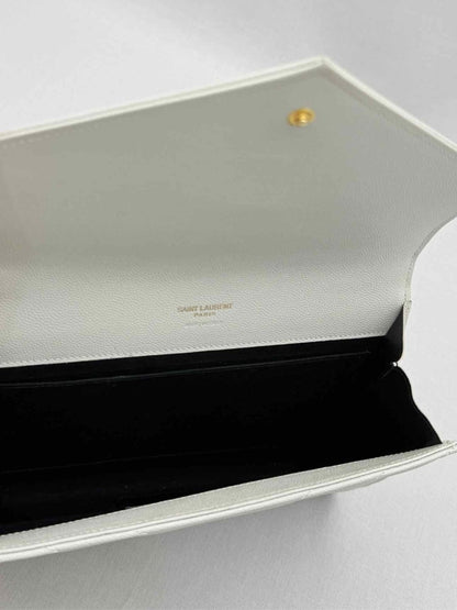Pre-loved SAINT LAURENT Cassandre Matelasse Flap White Wristlet at Reems Closet