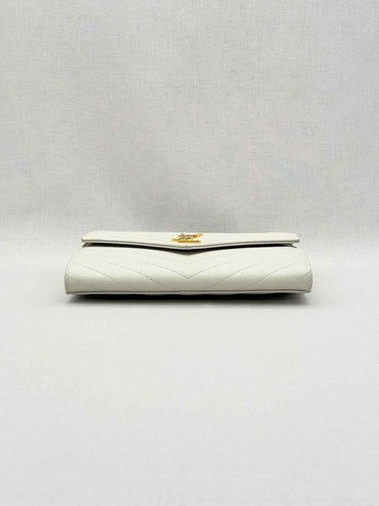 Pre-loved SAINT LAURENT Cassandre Matelasse Flap White Wristlet at Reems Closet