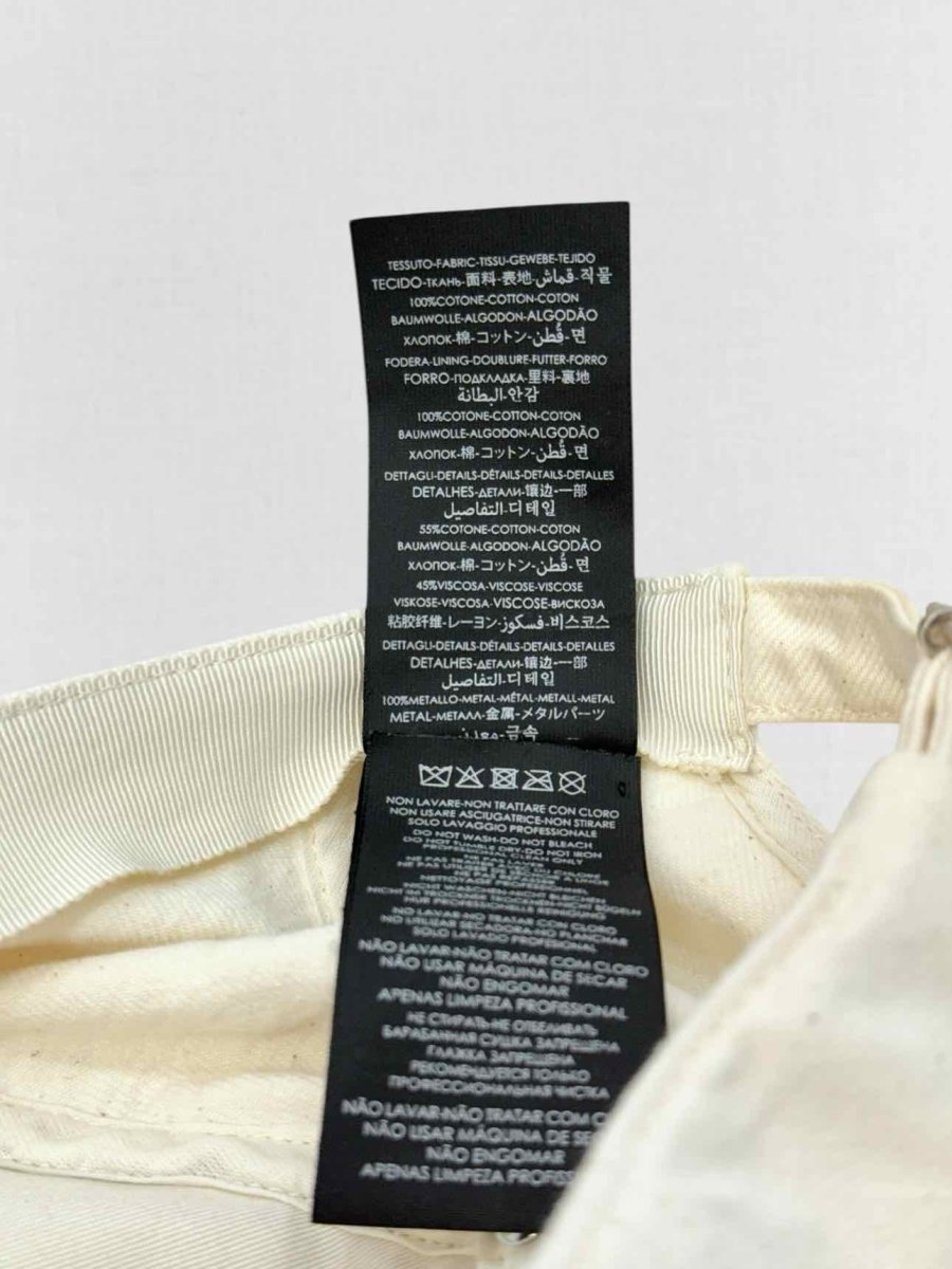 Pre - loved SAINT LAURENT Cream Cap at Reems Closet