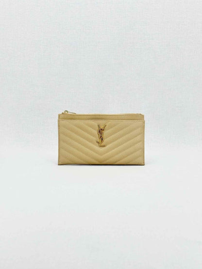Pre - loved SAINT LAURENT Monogram Beige Quilted Pouch at Reems Closet