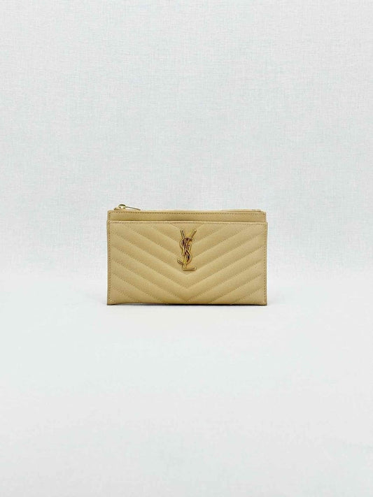 Pre - loved SAINT LAURENT Monogram Beige Quilted Pouch at Reems Closet