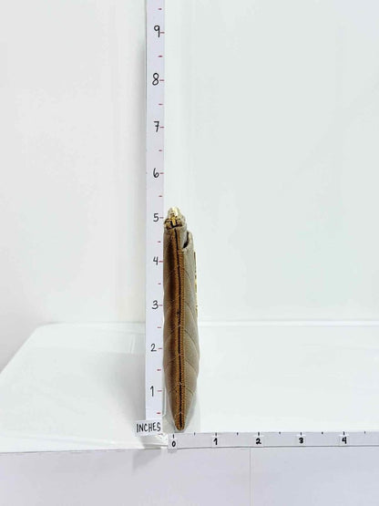 Pre - loved SAINT LAURENT Monogram Beige Quilted Pouch at Reems Closet