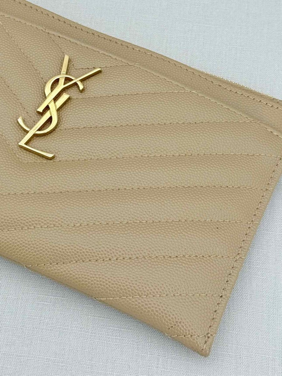 Pre - loved SAINT LAURENT Monogram Beige Quilted Pouch at Reems Closet