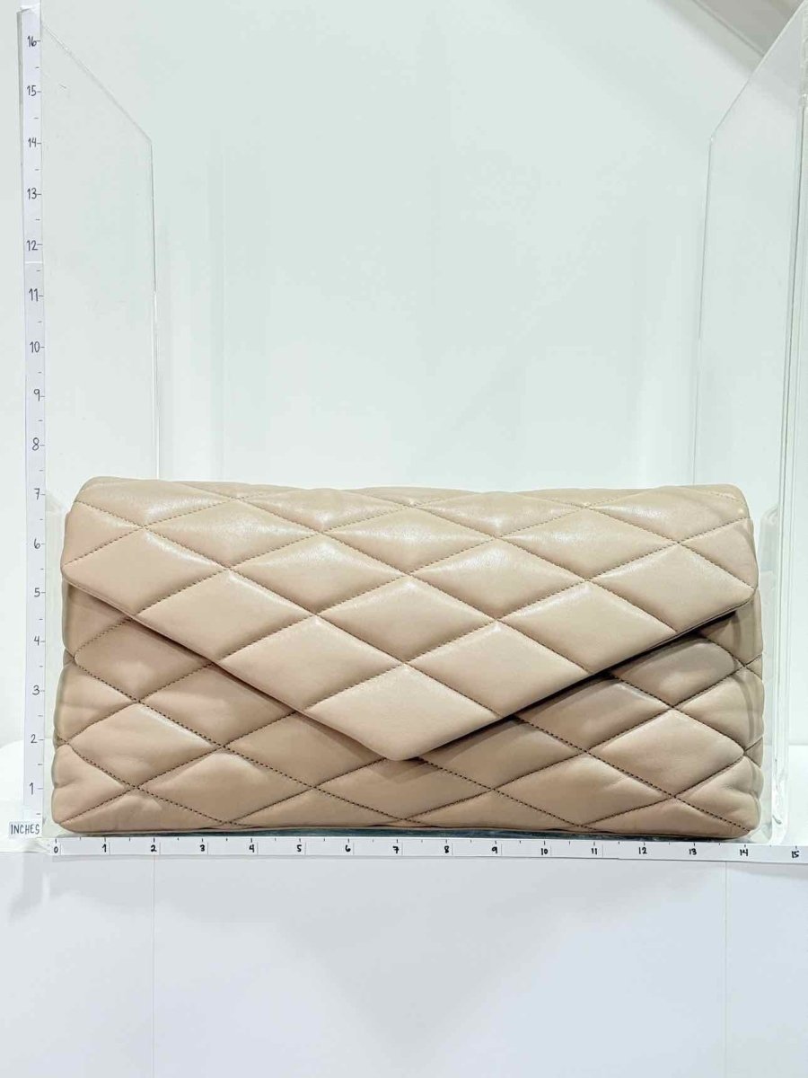 Pre - loved SAINT LAURENT Sade Puffer Envelope Beige Quilted Clutch at Reems Closet