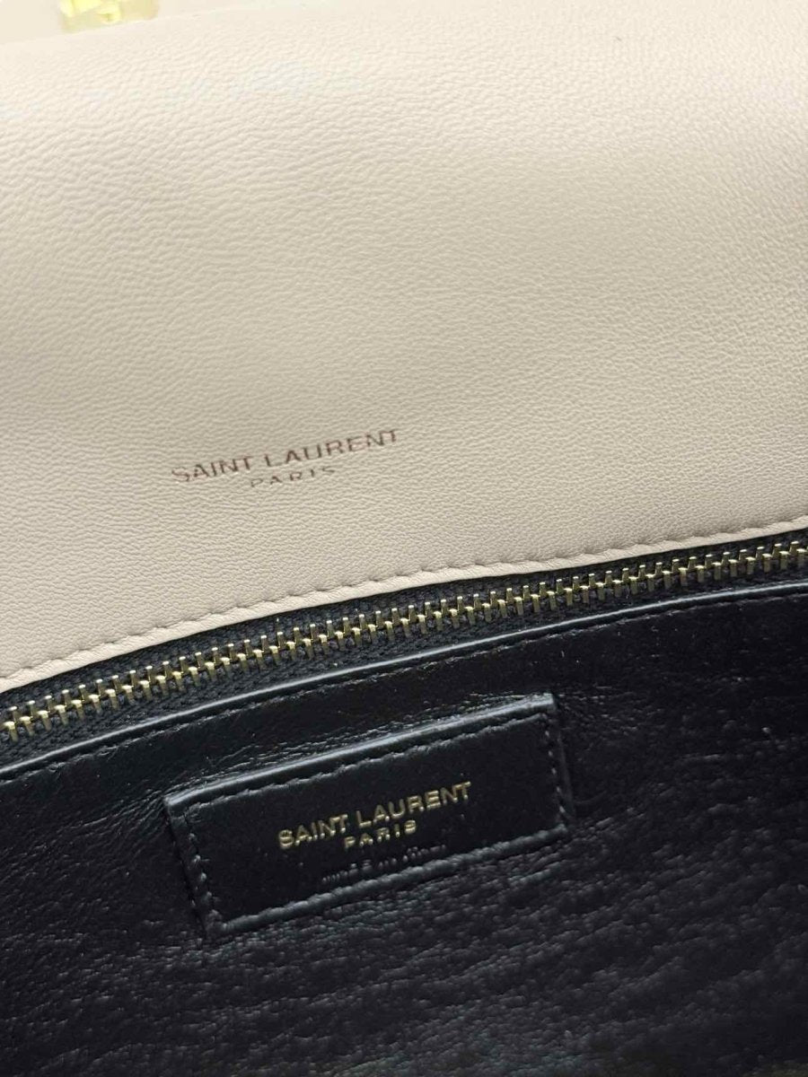 Pre - loved SAINT LAURENT Sade Puffer Envelope Beige Quilted Clutch at Reems Closet