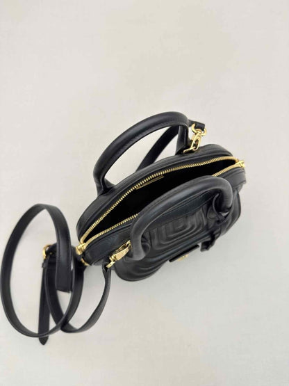 Pre-loved SALVATORE FERRAGAMO Flamma Black Quilted Satchel at Reems Closet