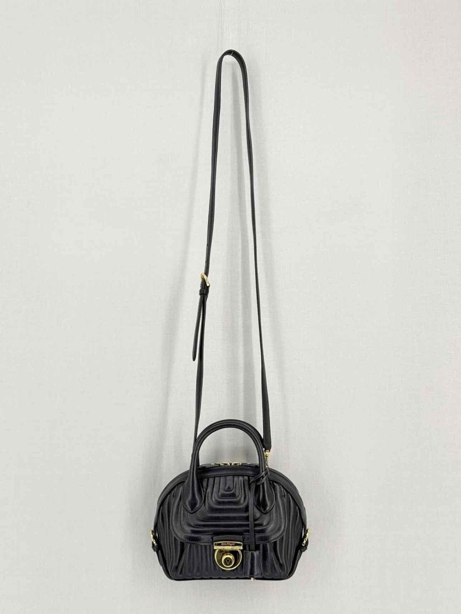 Pre-loved SALVATORE FERRAGAMO Flamma Black Quilted Satchel at Reems Closet
