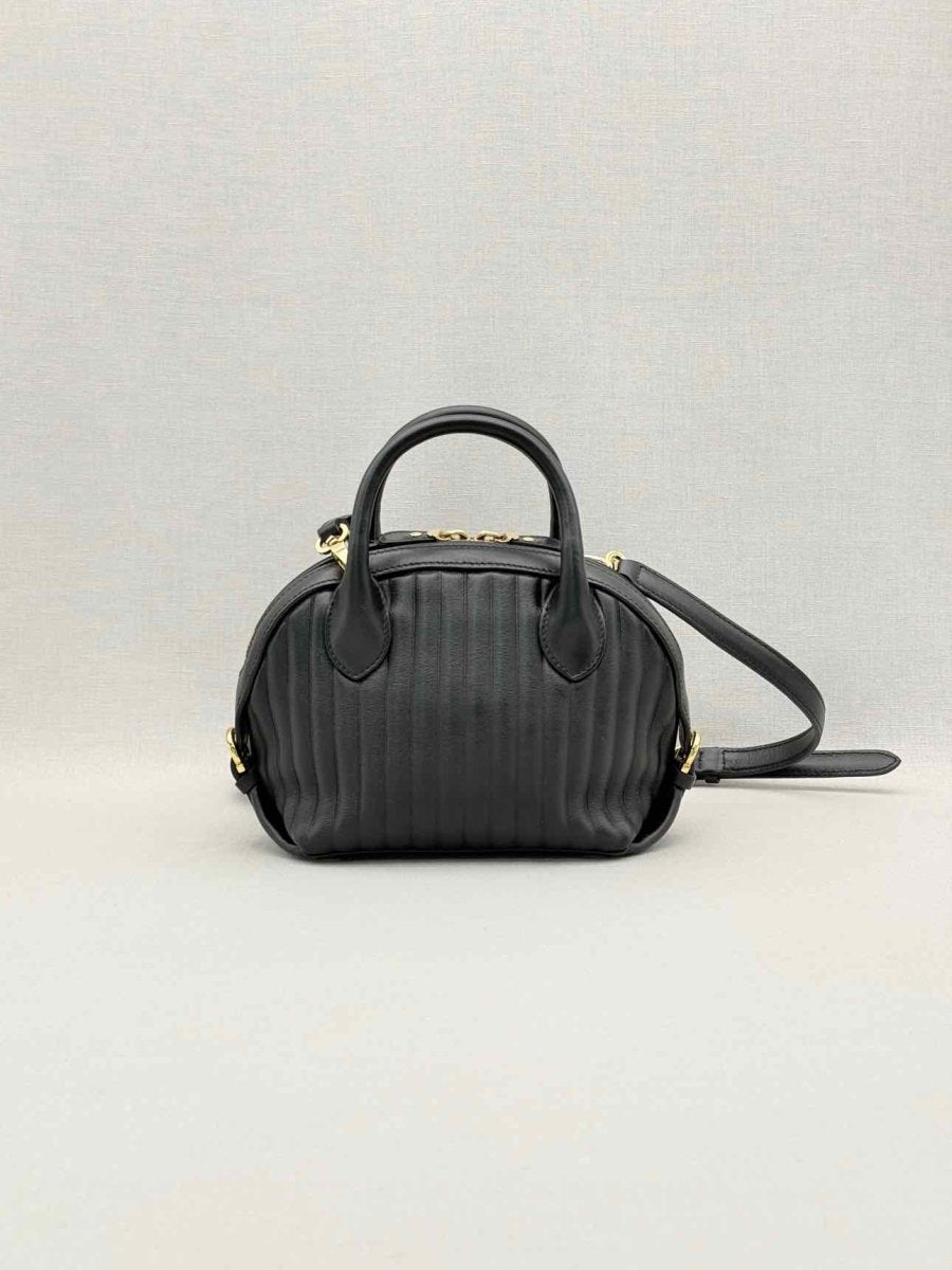 Pre-loved SALVATORE FERRAGAMO Flamma Black Quilted Satchel at Reems Closet