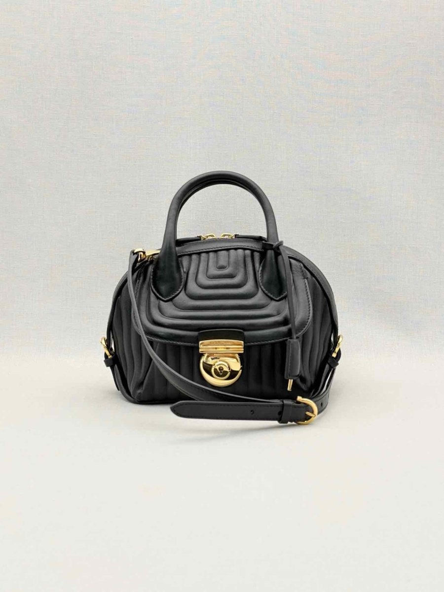 Pre-loved SALVATORE FERRAGAMO Flamma Black Quilted Satchel at Reems Closet