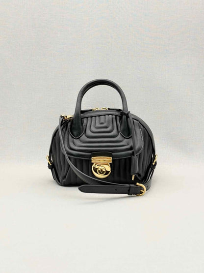 Pre-loved SALVATORE FERRAGAMO Flamma Black Quilted Satchel at Reems Closet