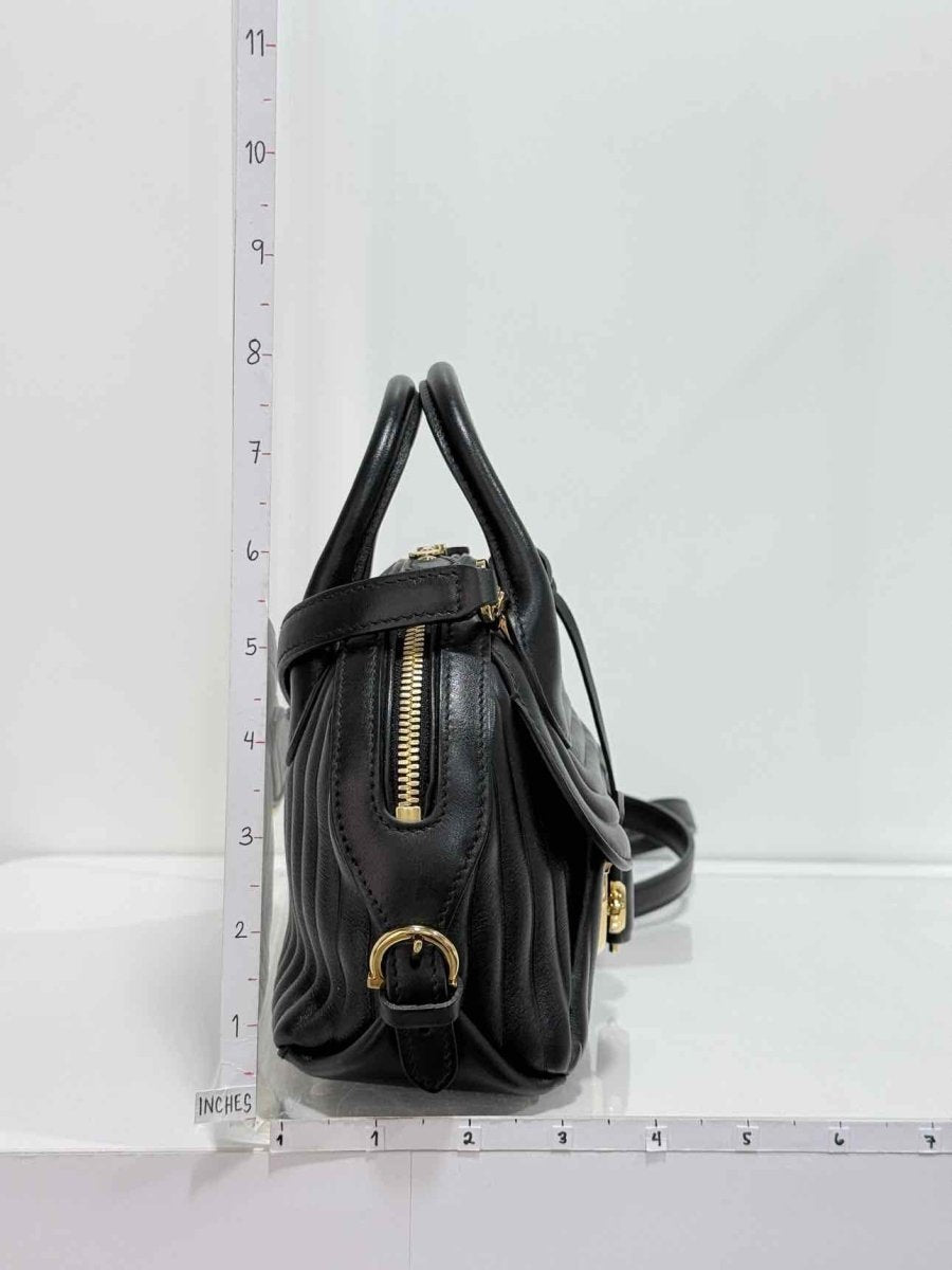 Pre-loved SALVATORE FERRAGAMO Flamma Black Quilted Satchel at Reems Closet