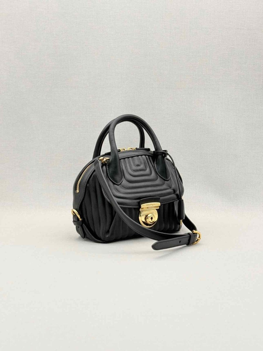 Pre-loved SALVATORE FERRAGAMO Flamma Black Quilted Satchel at Reems Closet